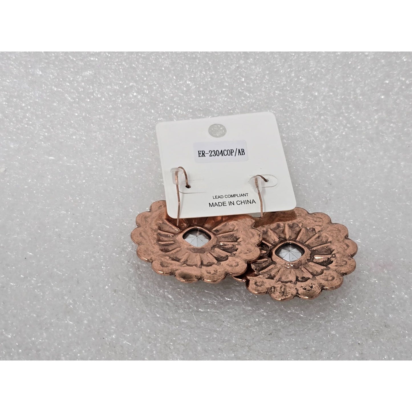 Copper Tone Floral Pattern Earrings With Iridescent Gemstone Center