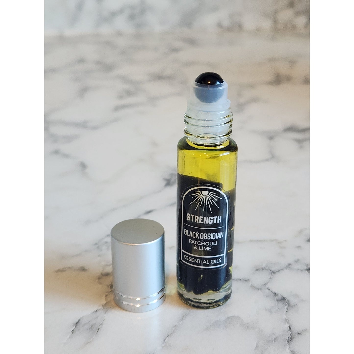 Strength Black Obsidian Crystals Patchouli & Lime Essential Oils Roll On 0.5 Oz