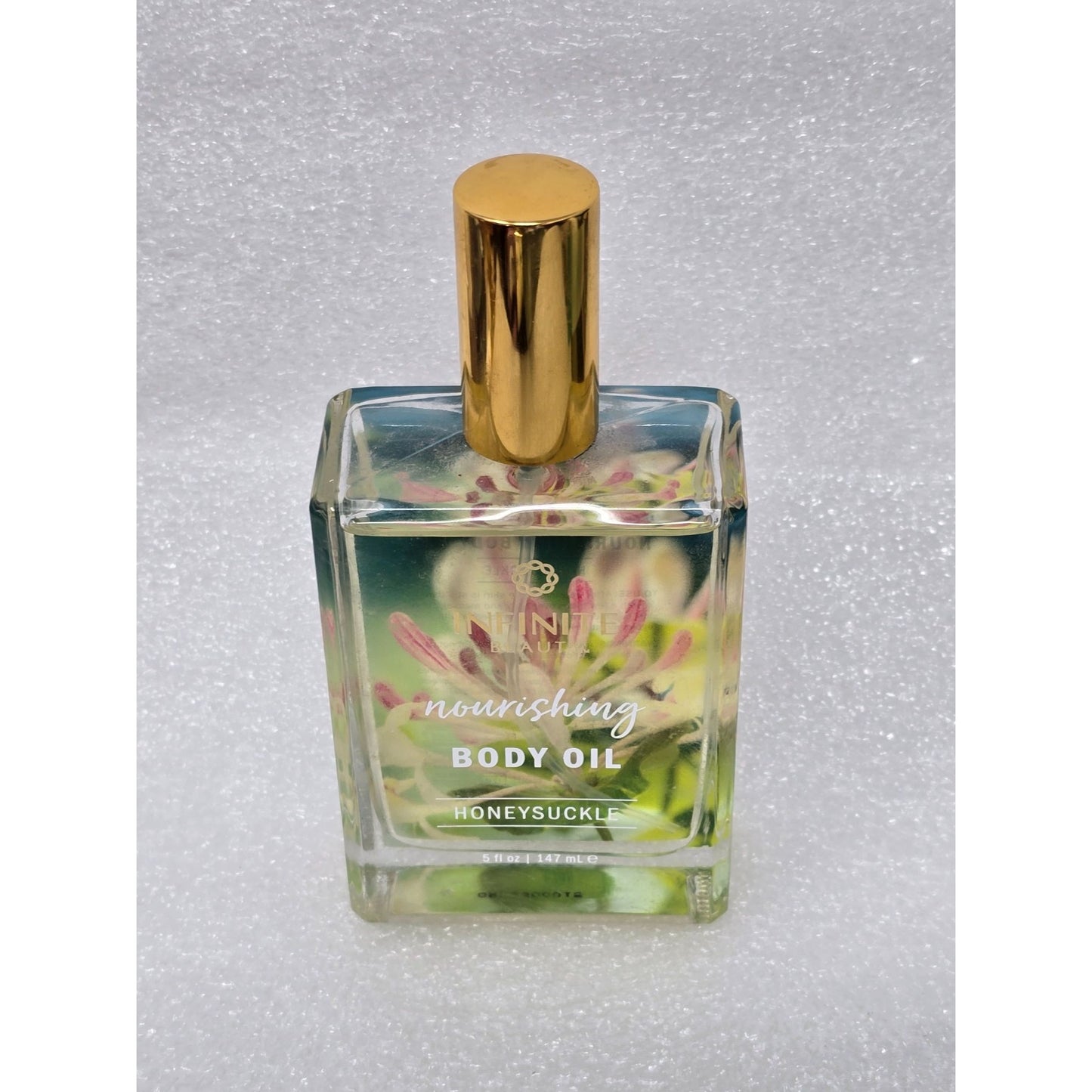 Infinite Beauty Nourishing Body Oil Honeysuckle 5 Fl Oz / 147 mL Glass Bottle
