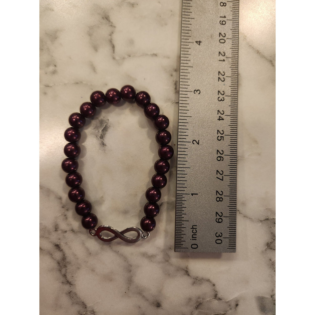 Infinity Symbol Stretch Bracelet With Burgundy Beads