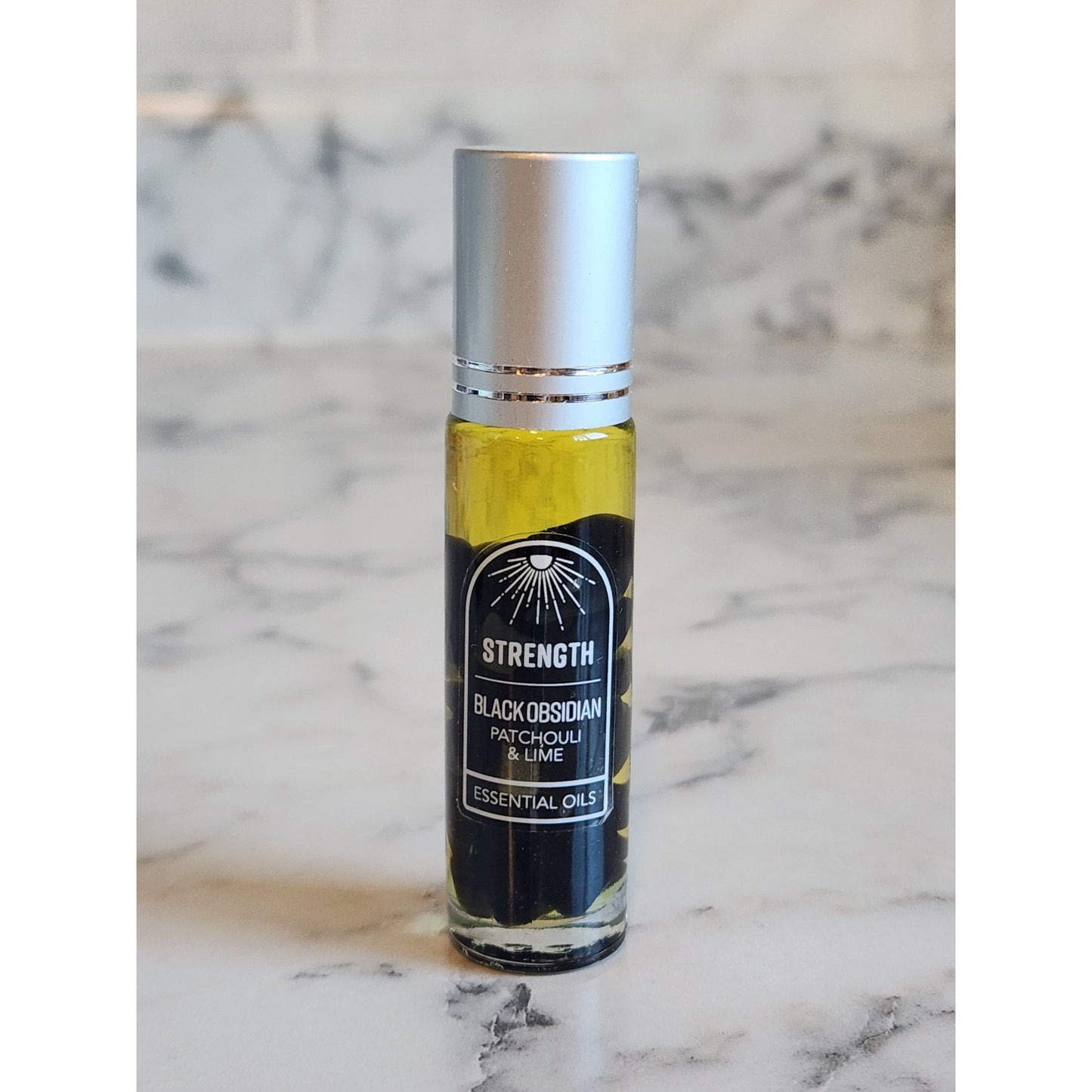 Strength Black Obsidian Crystals Patchouli & Lime Essential Oils Roll On 0.5 Oz