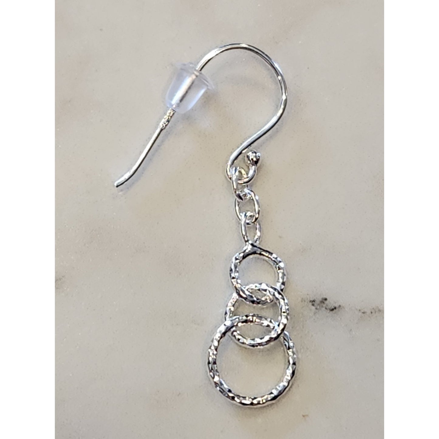 Sterling Silver Dangle Earrings With Hammered Triple Circle Design
