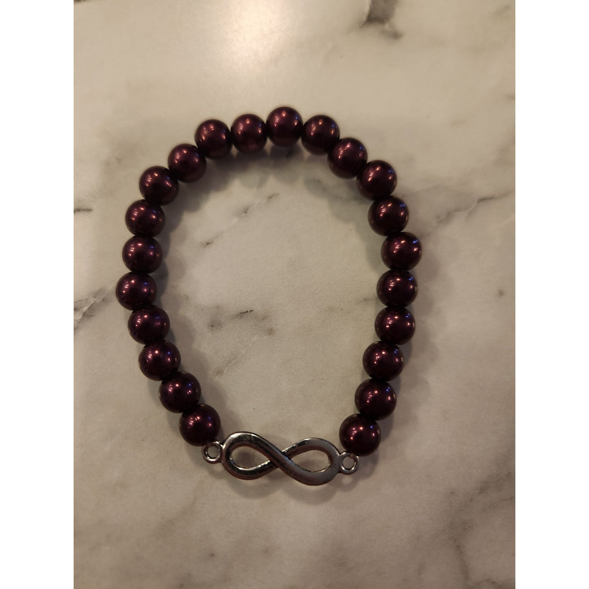 Infinity Symbol Stretch Bracelet With Burgundy Beads