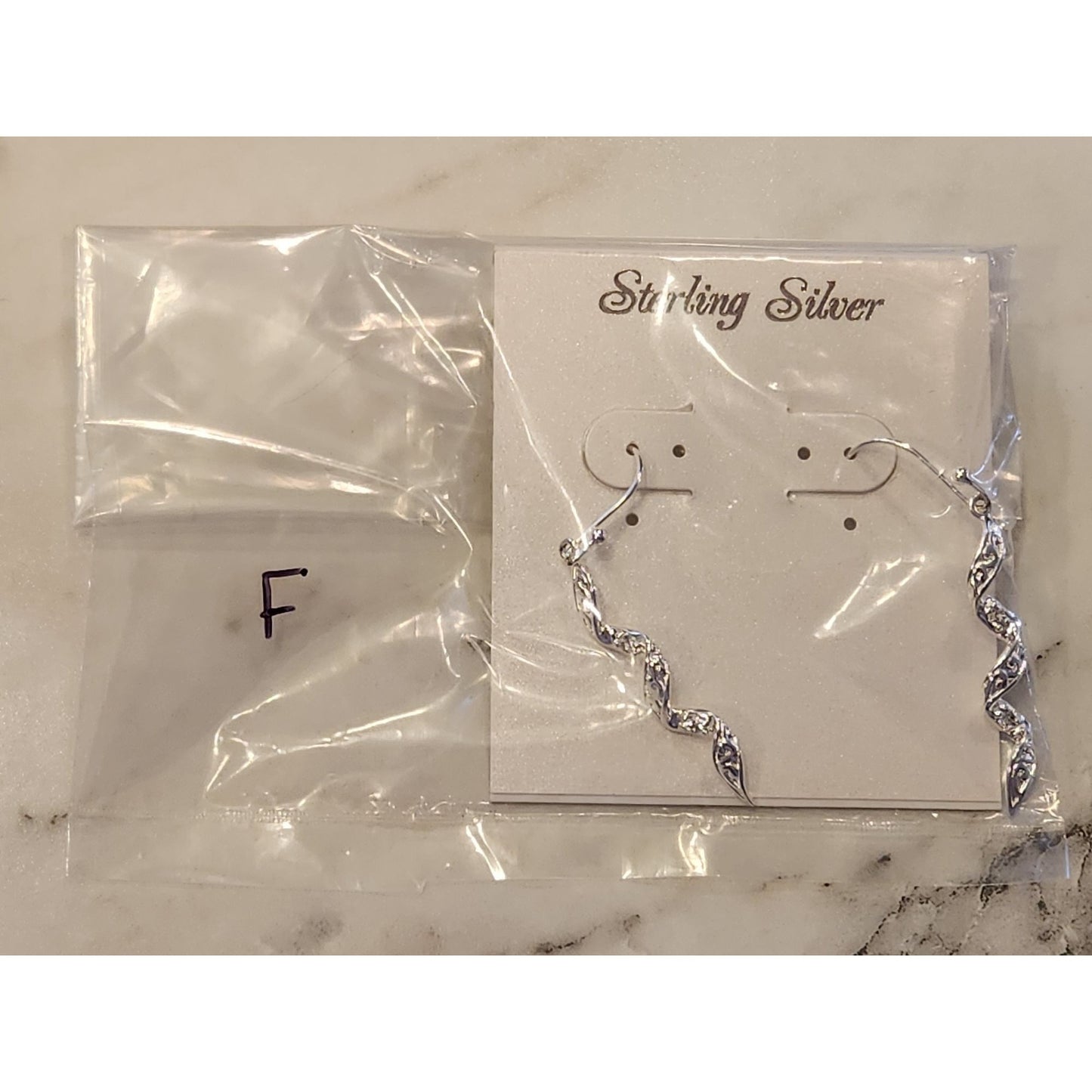Sterling Silver Twisted Dangle Earrings With Intricate Detailing & Hook Closure