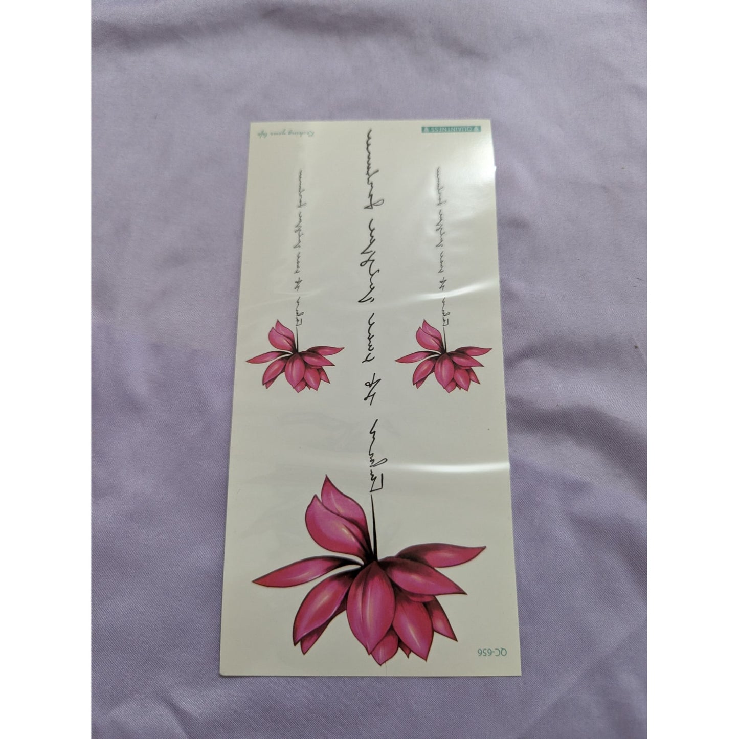 Elegant Pink Lotus Temporary Tattoo with Calligraphy Artistic Floral Design