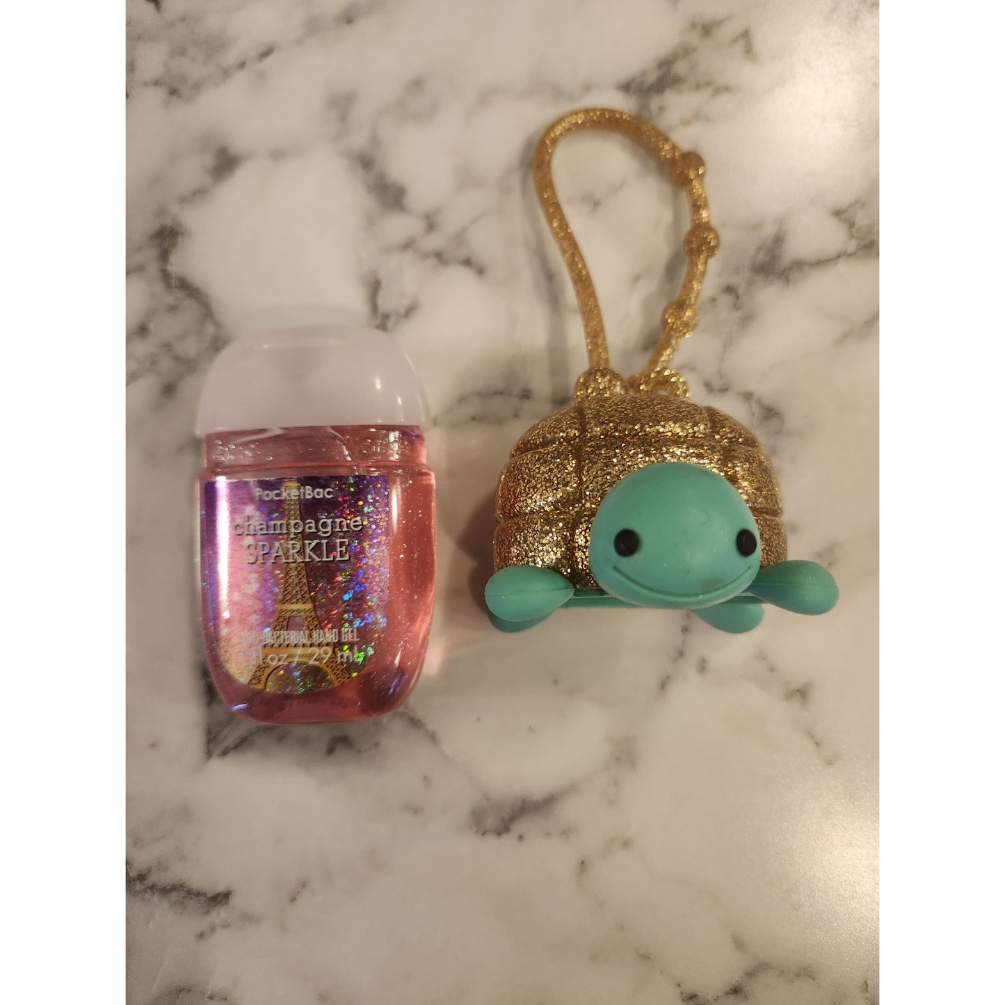 Bath & Body Works Champagne Sparkle Hand Sanitizer in Turtle PocketBac Holder