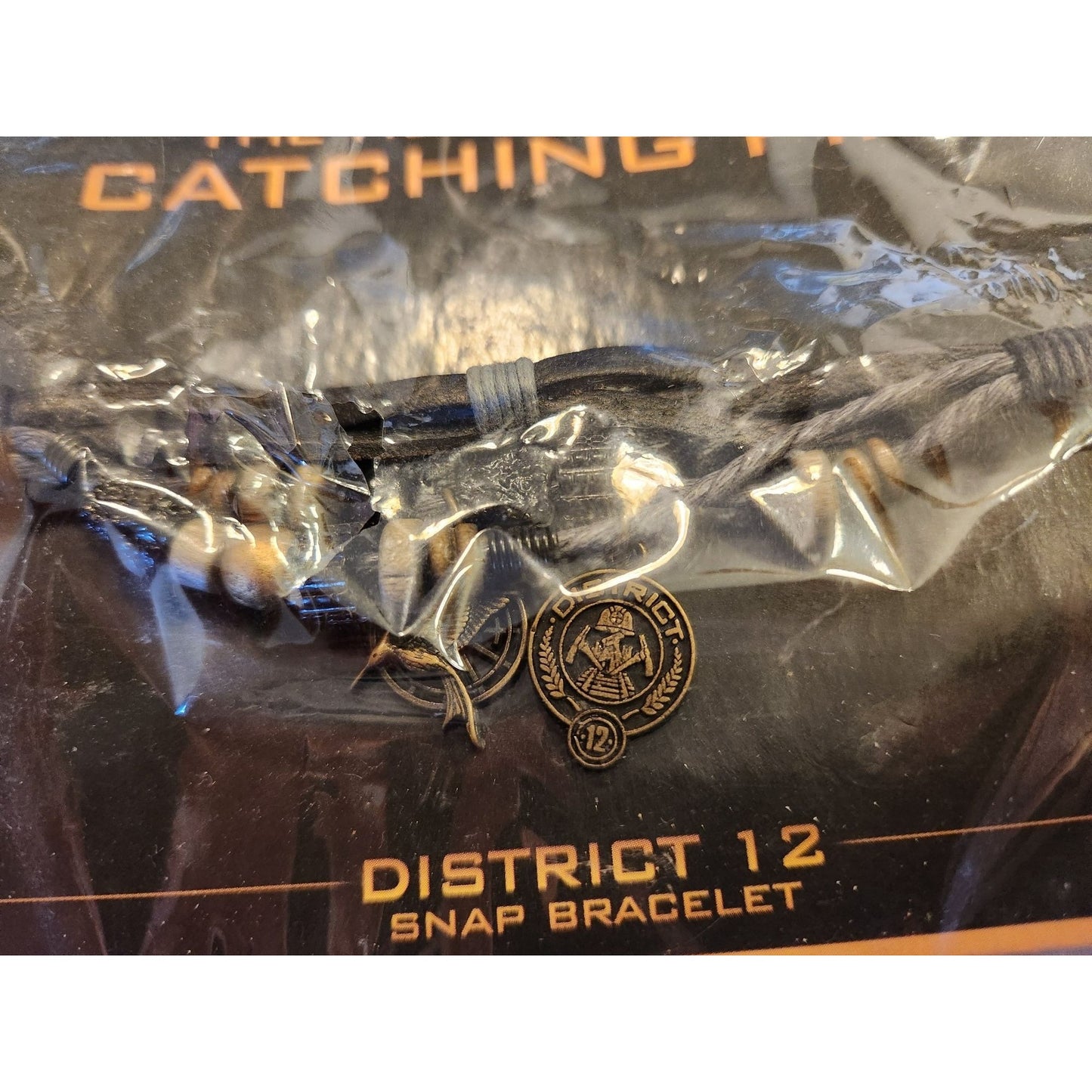 The Hunger Games Catching Fire District 12 Snap Bracelet By NECA